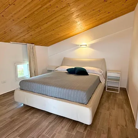 Апартаменты Borgo 84 Olimpia Con Piscina Fronte Mare
