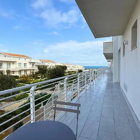 Апартаменты Borgo 84 Olimpia Con Piscina Fronte Mare
